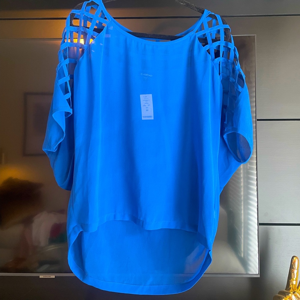 bebe royal blue cut out blouse